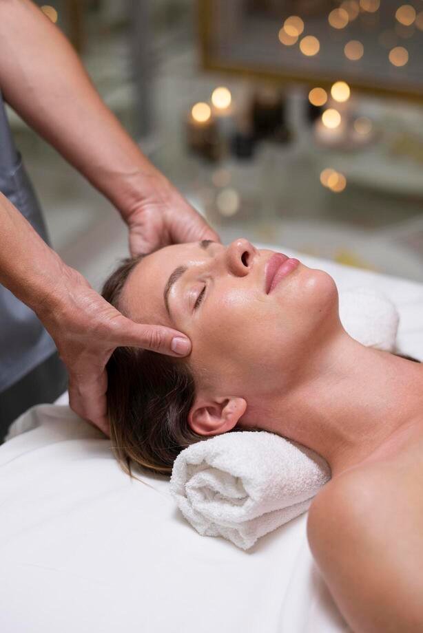 close-up-relaxed-woman-getting-massage